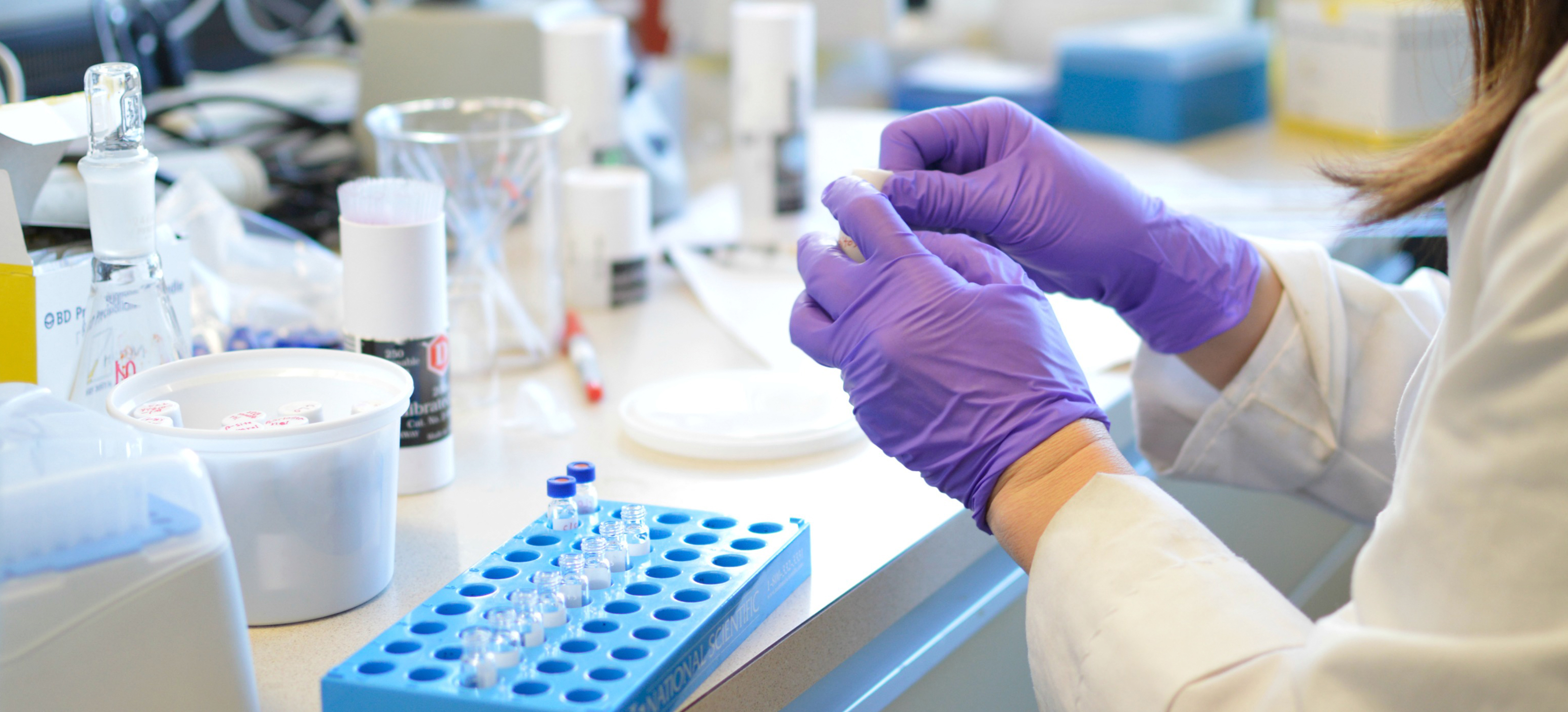 Person working with lab equipment