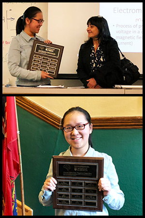 Qin receiving her award.