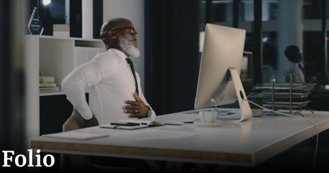 man sitting at desk