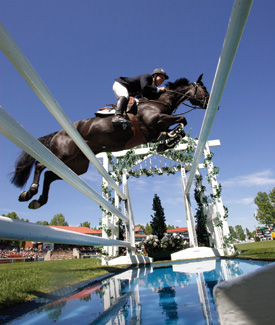 Horse and rider clear the liverpool in the International Ring