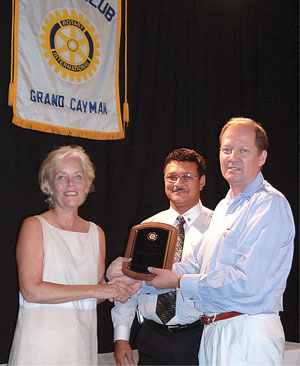 April Bending receiving Rotary Club award