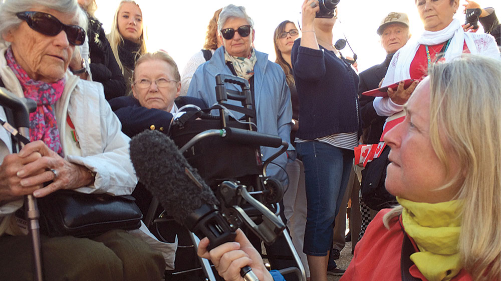 Margaret Evans covering the 70th anniversary of D-Day in Normandy, France