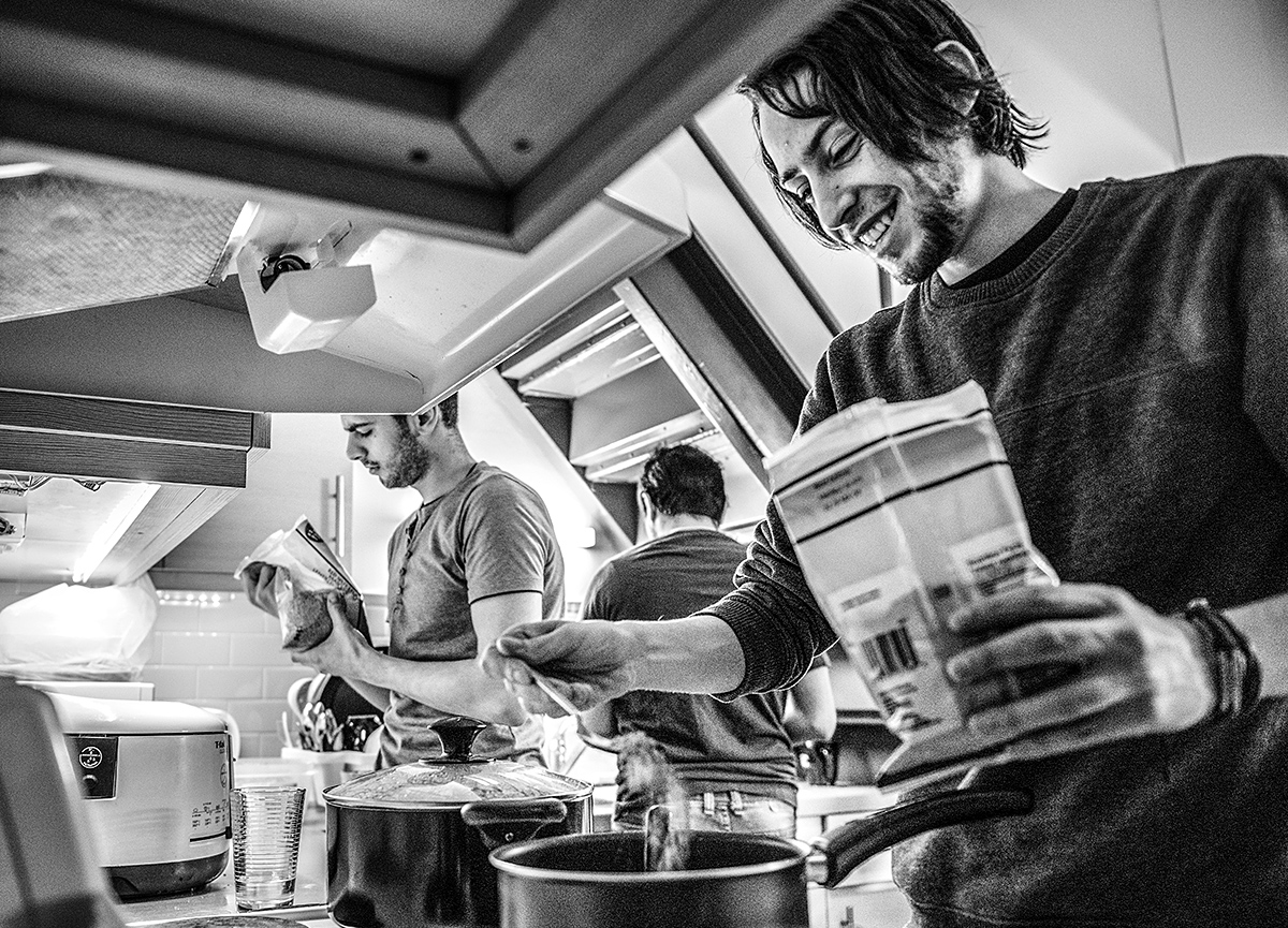 Syrian students cooking a meal