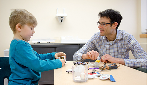 Breton Cameron (l) makes conversation with Lonnie Zwaigenbaum at the Glenrose Rehabilitation Hospital Research Centre.