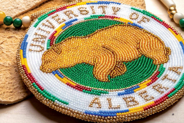 Beaded University of Alberta emblem