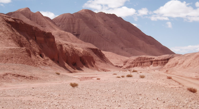 This is part of the Arizaro basin. Claire Currie‘s research indicates that subsidence occurred in this area during lithosphere removal.  Subsidence started about 20 million years ago. As the surface subsided, the basin filled with sediments -- over 3 km thick!  The region then started to uplift in the last 8 million years, and you now see the sediments as high elevation features. (Photo by Claire Currie, University of Alberta.)