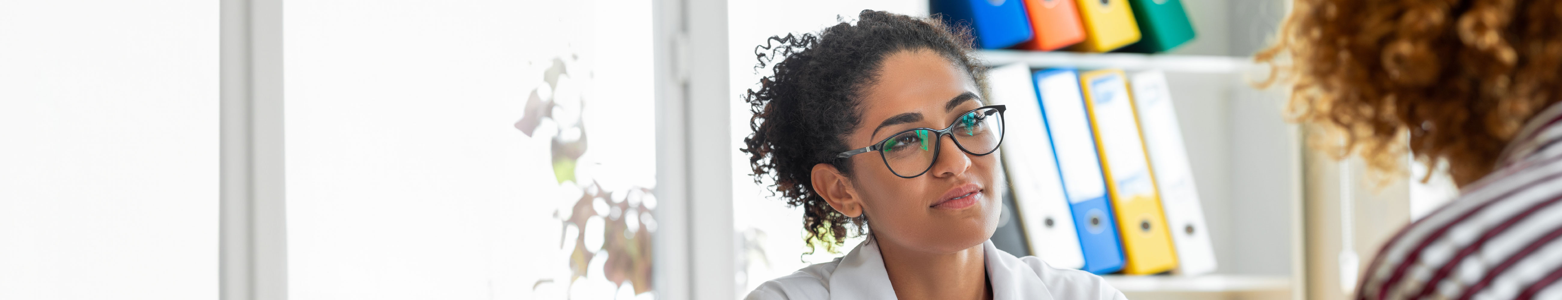 Woman looking at someone talking