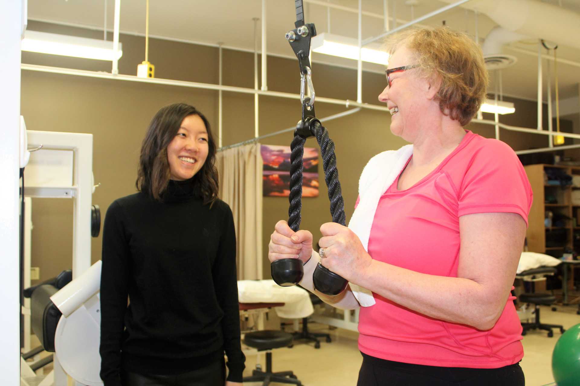 Arden Pang working with patient