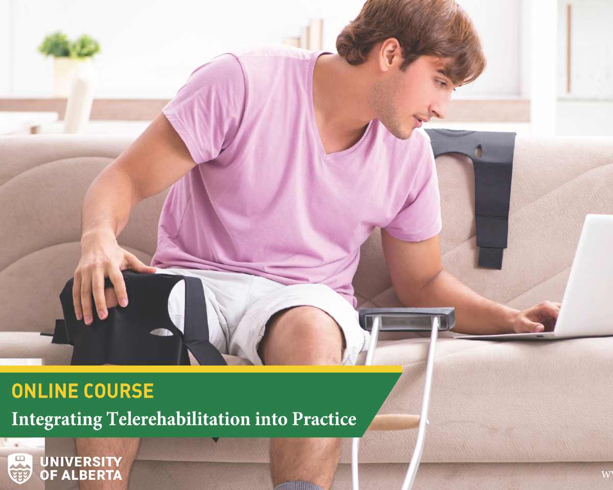 Man sitting on couch using laptop with crutches