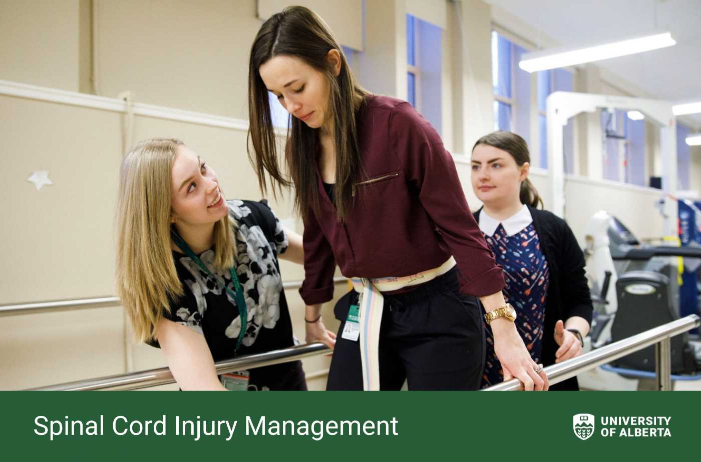 Two women helping a patient walk