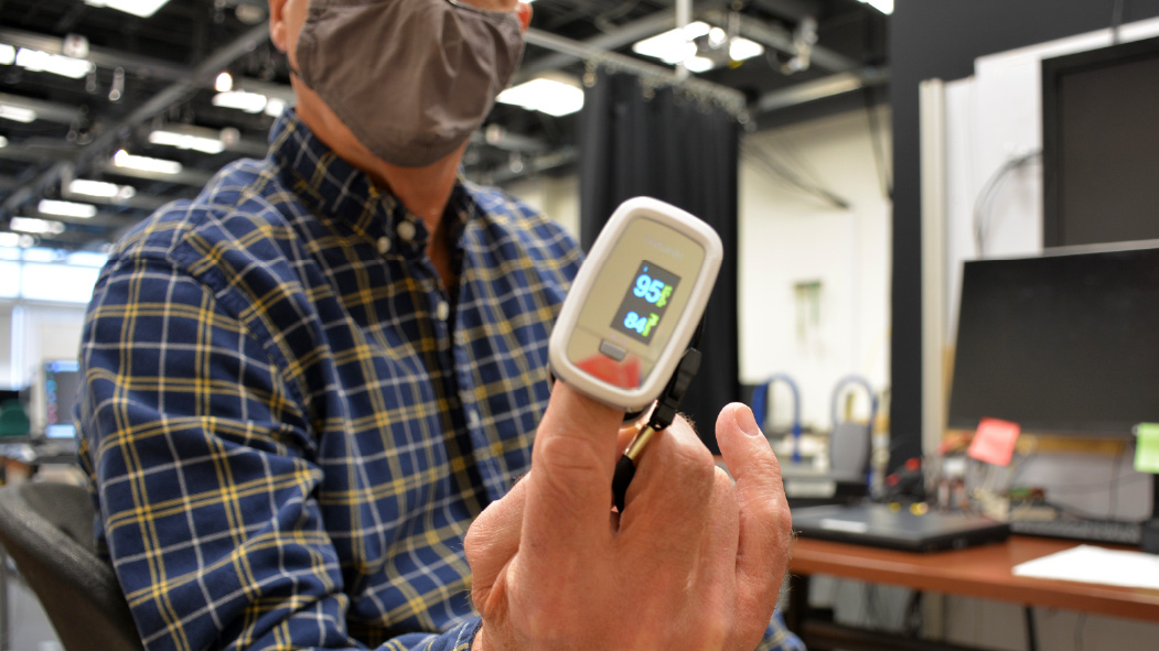 A ProMote device monitors a patient's heart rate.