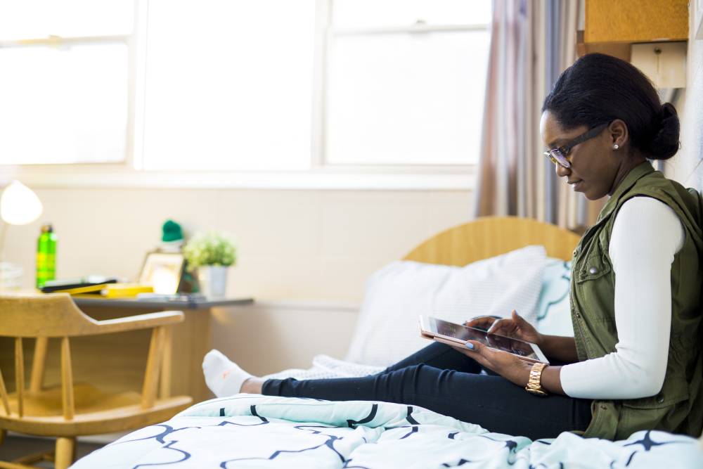 UAlberta student resident using tablet