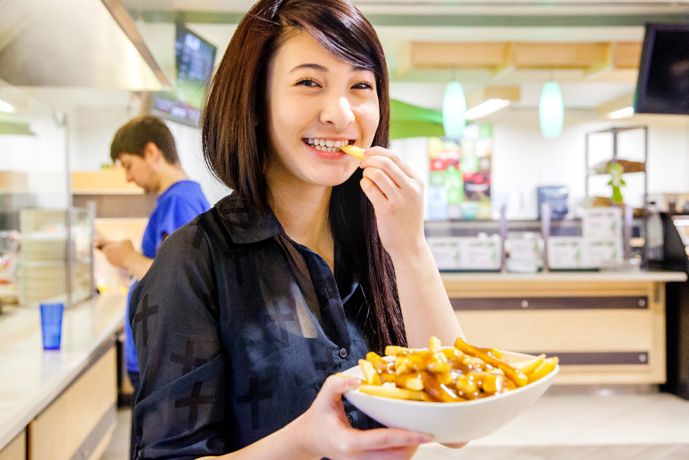 Lister Market Woman eating fries