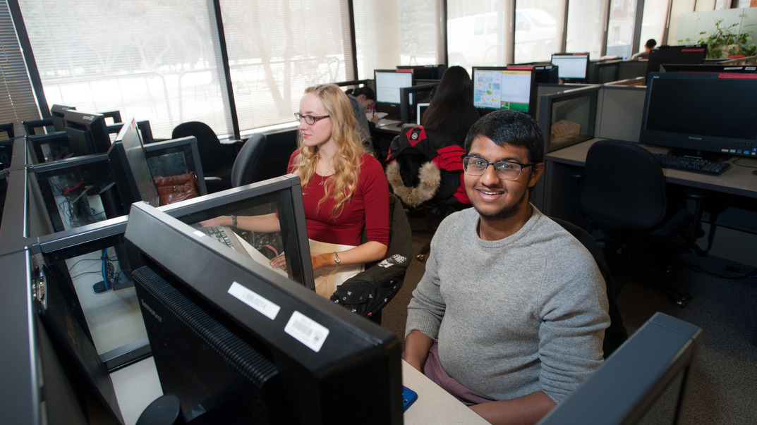 students studying in a computer lab