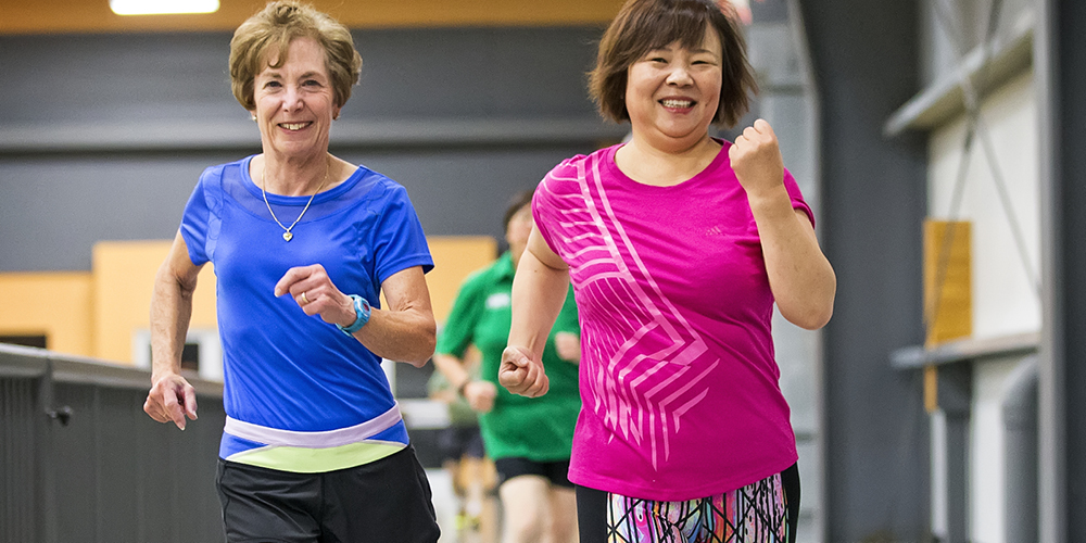 Saville members enjoying a walking class at the indoor track