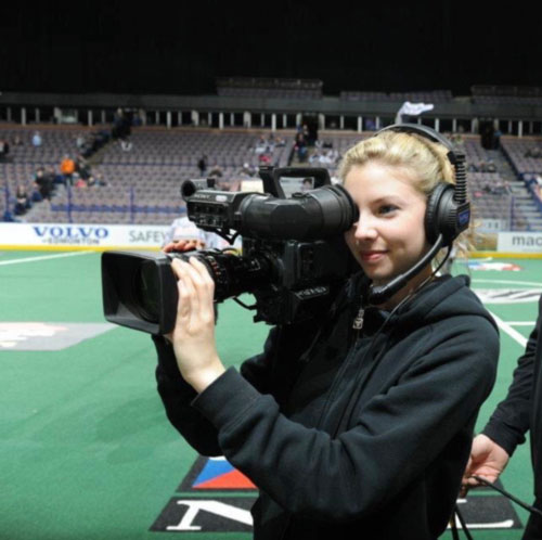 Eve operating a camera