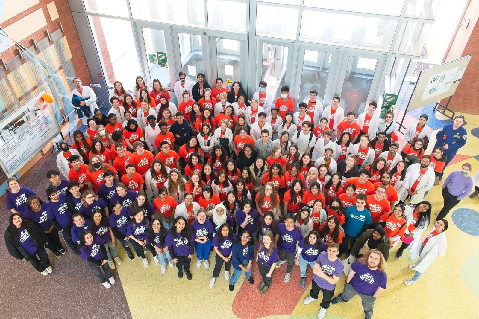 A group photo of the Science FUNday student volunteers. This vast group of undergraduate students spent the day sharing the wonders of science with families visiting the U of A campus, as well as assisting with full set up and take down of the event.