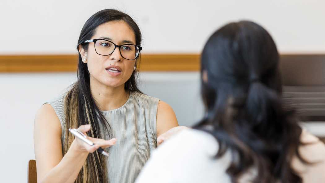 Woman talking to another woman