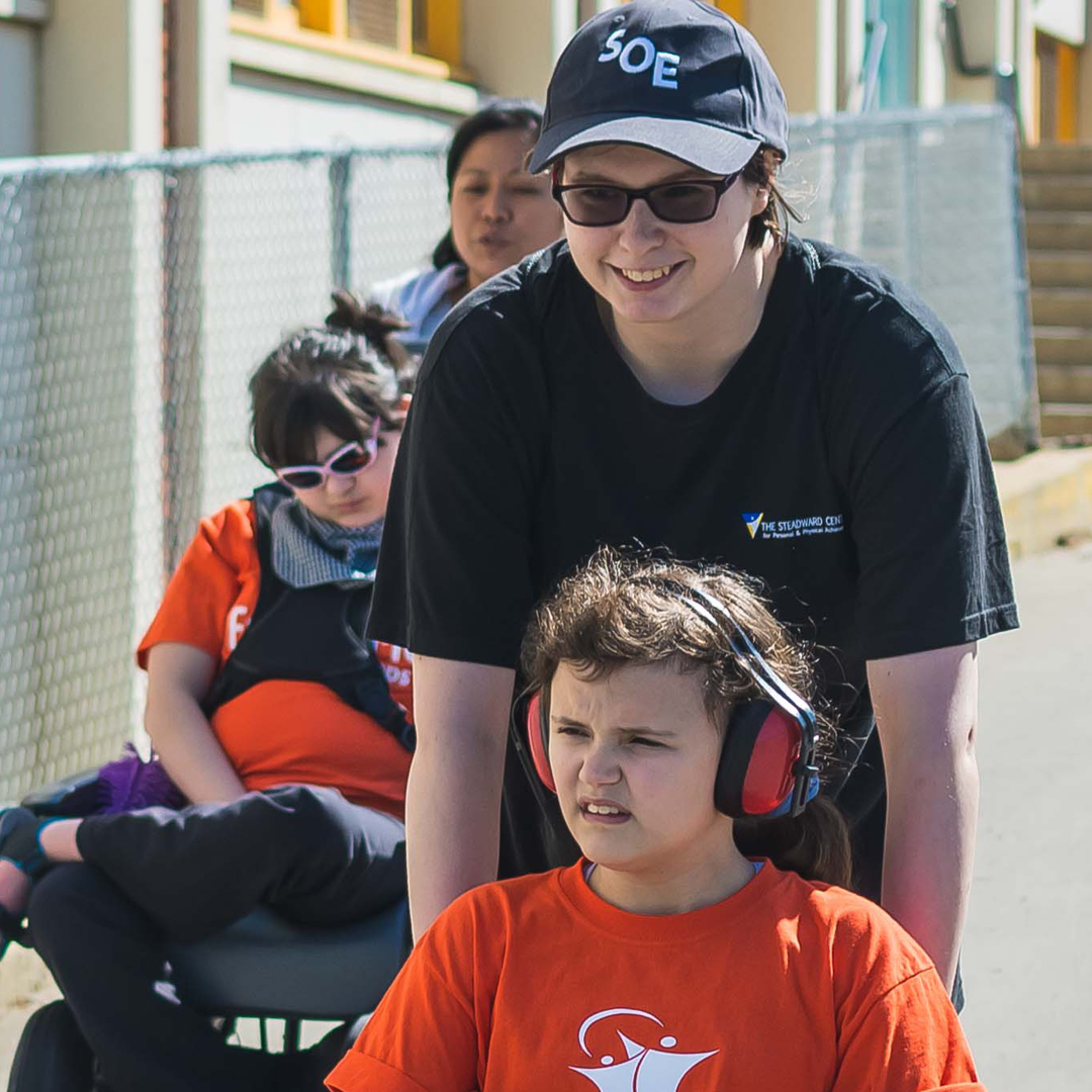 Volunteer working with a Steadward Centre Participant