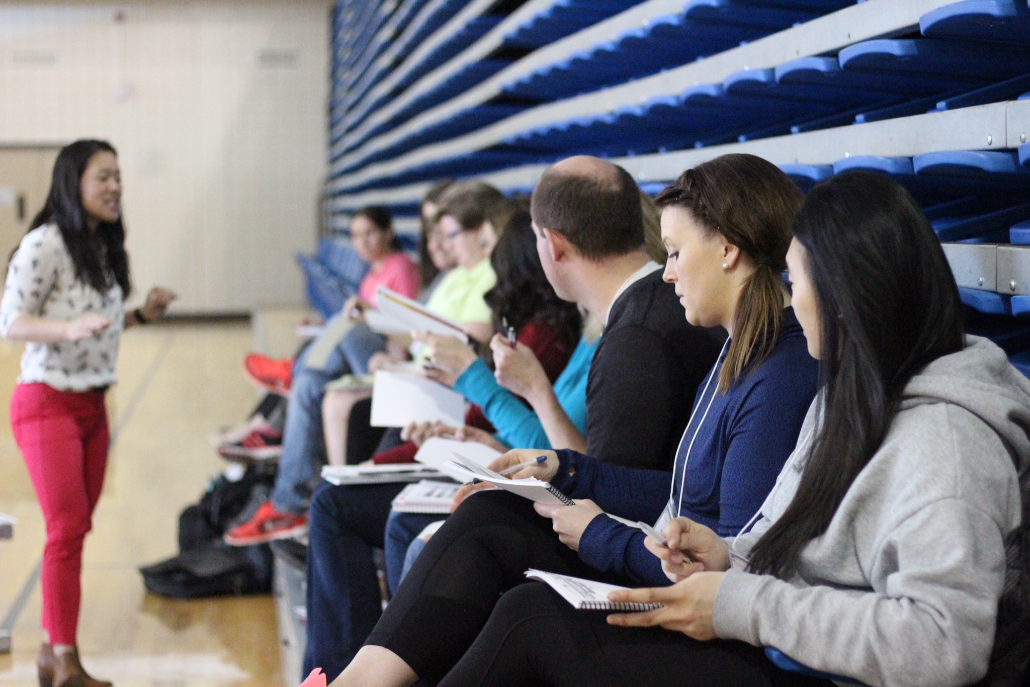 Stephanie Liew presenting to a group at the Adapted Physical Activity Symposium