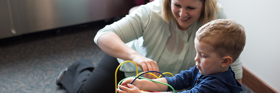 Woman and child playing