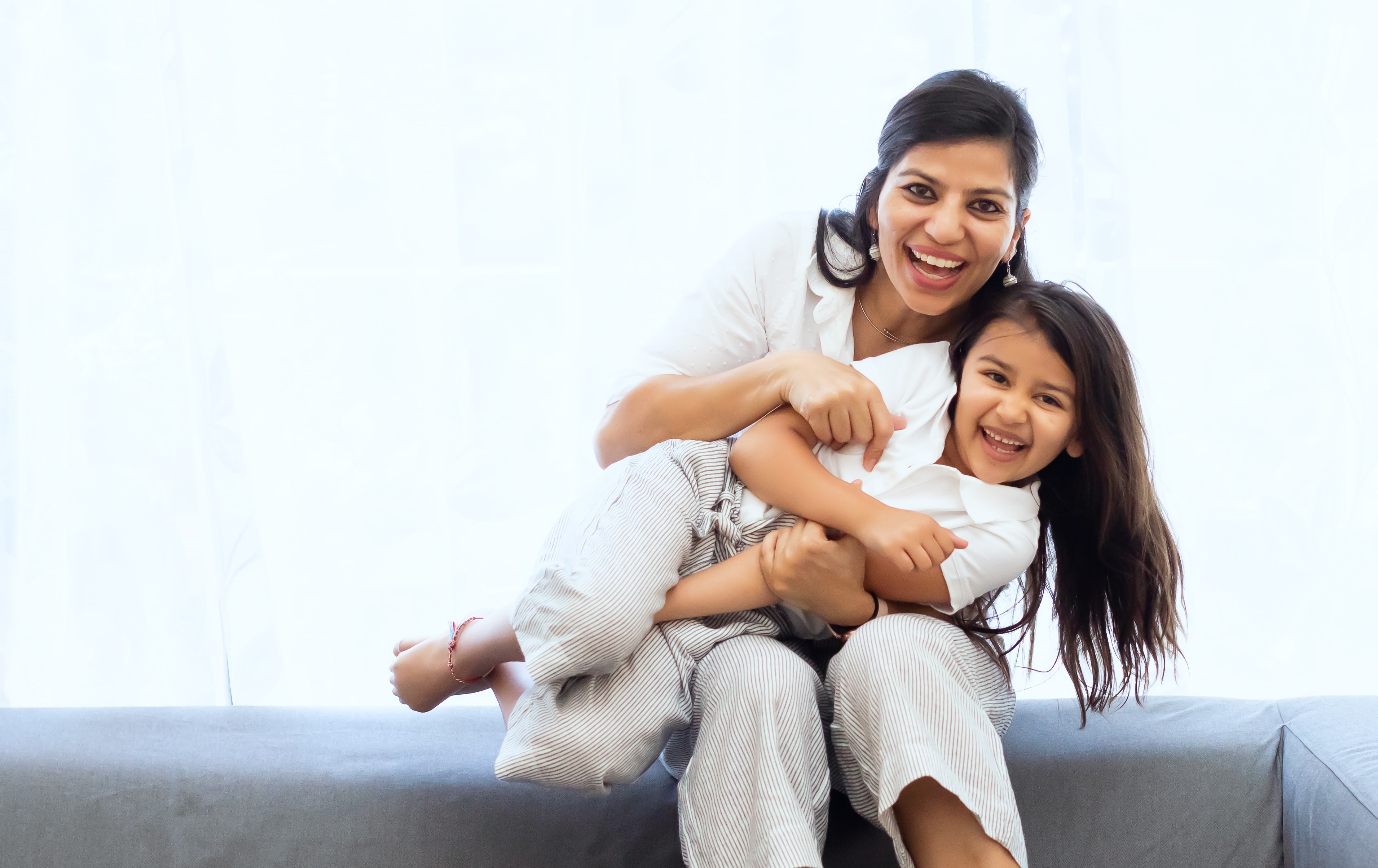 Smiling woman and child