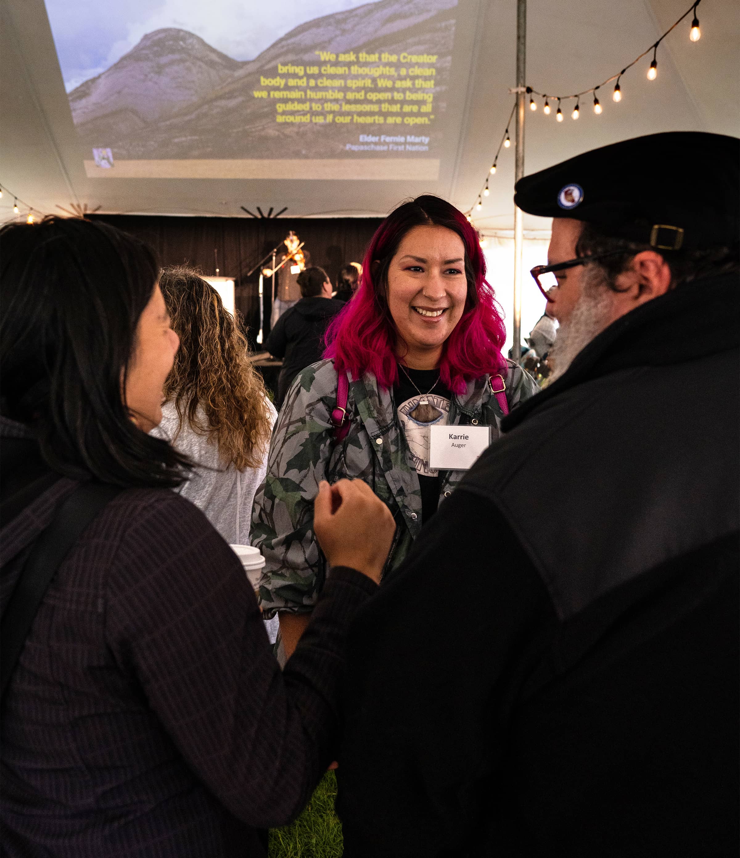 Karrie Auger shares a laugh with Paul Gareau and Lucy Lu.