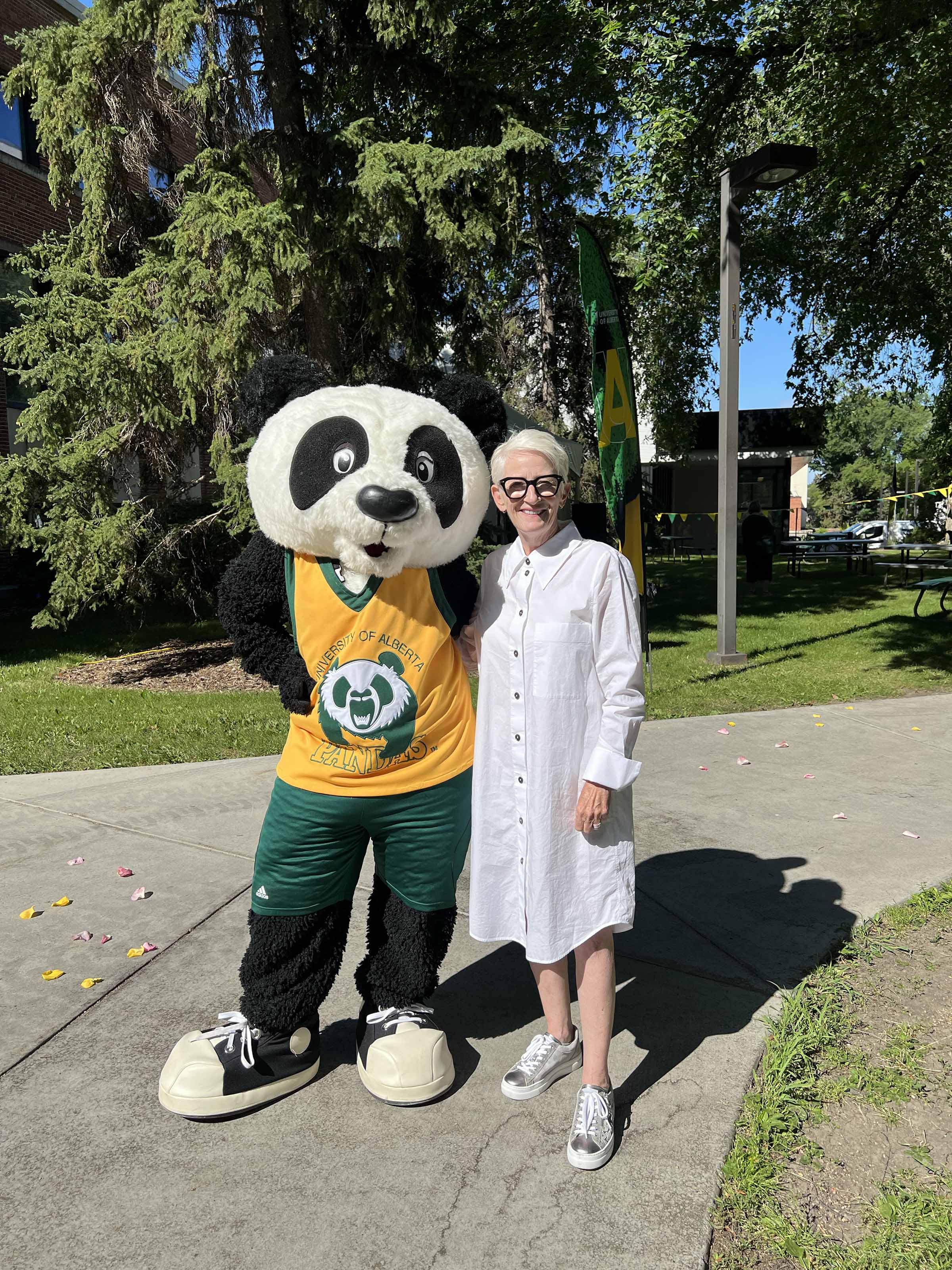 U of A mascot Patches poses with U of A Chancellor Peggy Garritty.