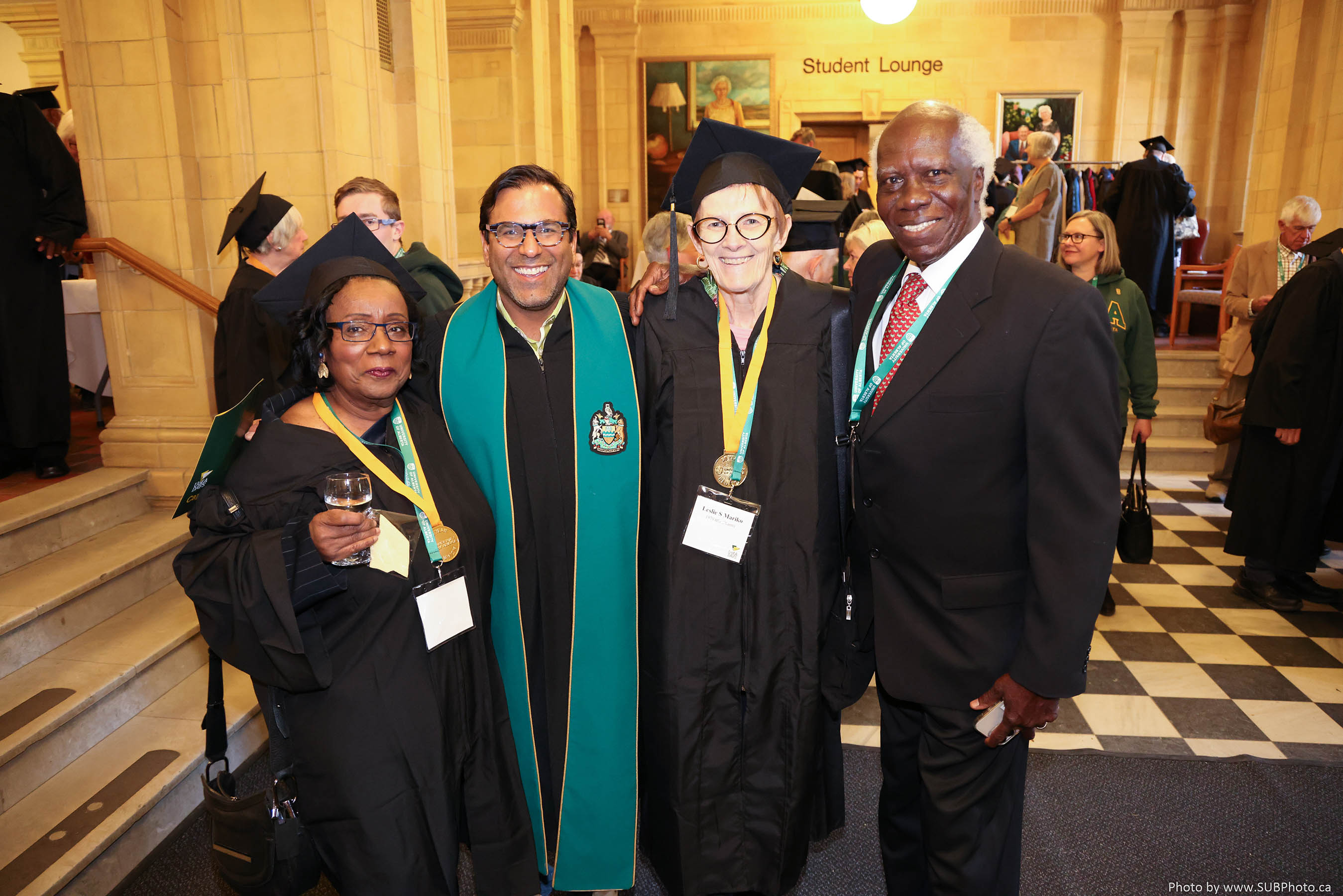 Graduates mingle at a reception after the Cap n’ Gown ceremony