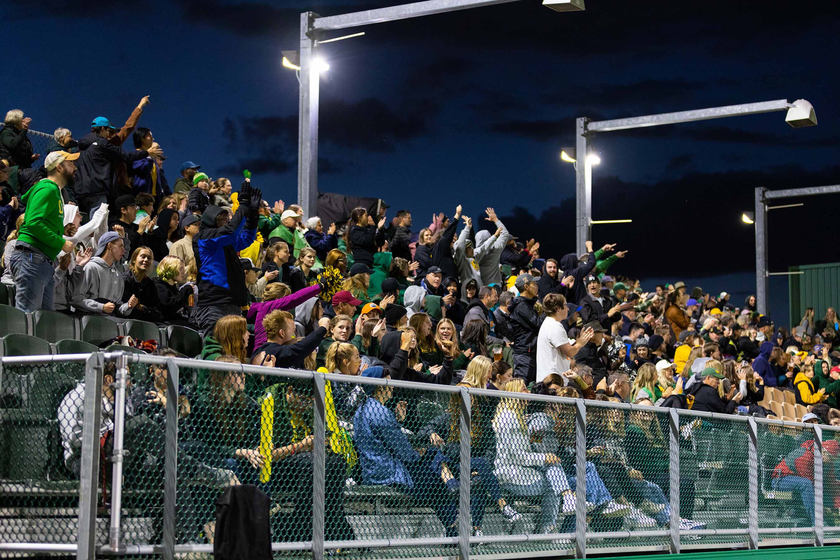 Spectators watch the University of Alberta Golden Bears take on the defending Hardy Cup Champion Saskatchewan Huskies at Varsity Field on South Campus