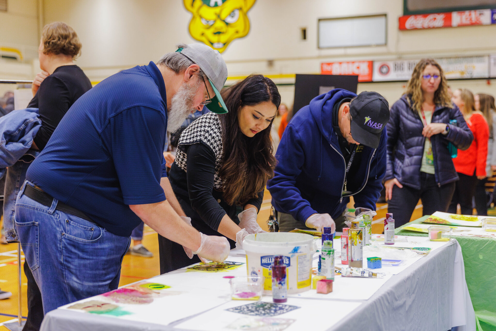 From left to right, Brad Istace with IST, Nehal Sharma from the Faculty of Education and Terry Grendus with F&O work on collaborative art projects. Building a positive, team-based culture is part of the “Creating Connection” theme within the strategy.