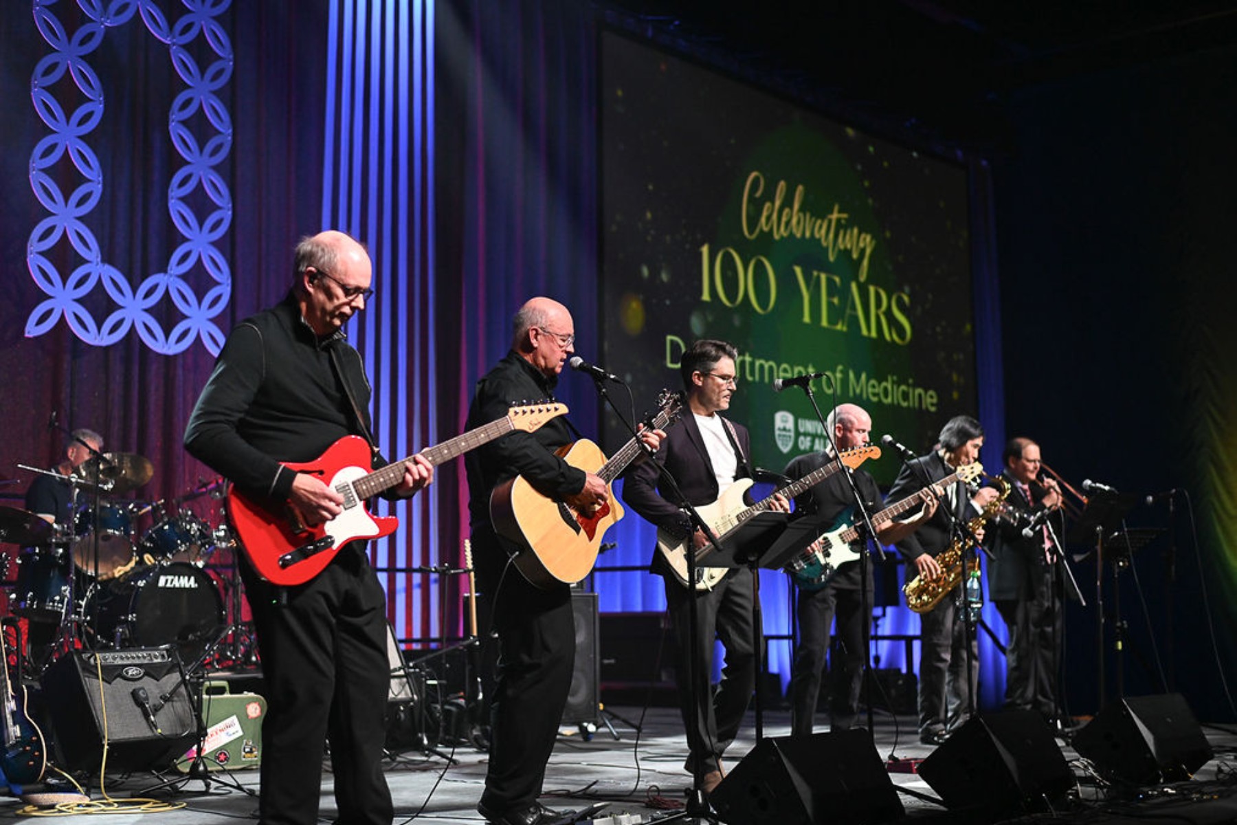 Performance by HARDWIRED, the band formed by members of the Department of Medicine. 