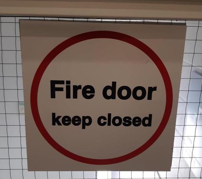 Wedged Open Fire Doors Finance Procurement and Planning