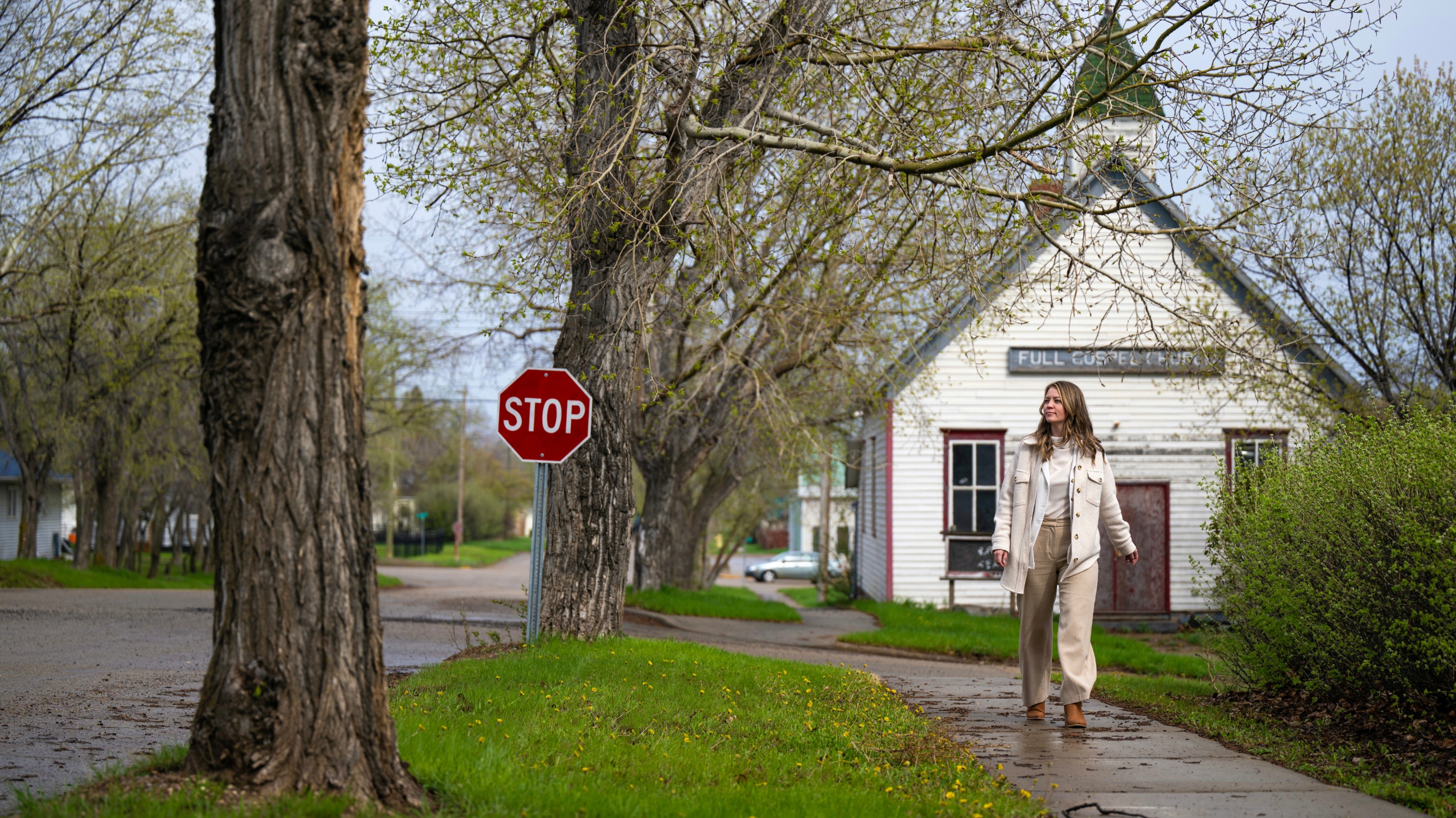 Christie Brulhart goes for a stroll in the small village of Consort, Alta., where she is taking up practice as the sole nurse practitioner. (Photo: John Ulan)