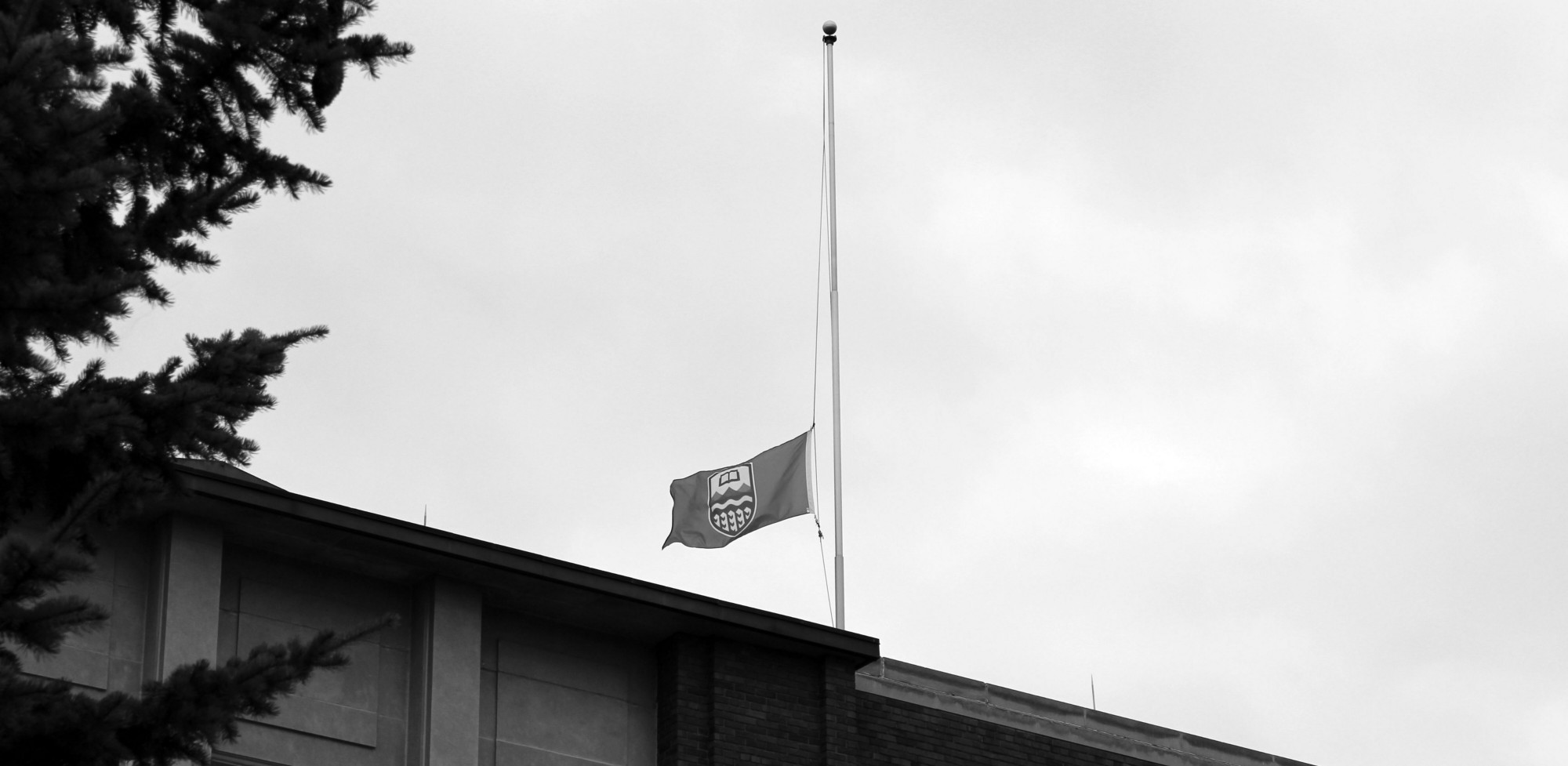 Lowering the Flag: National Day of Mourning | The Quad