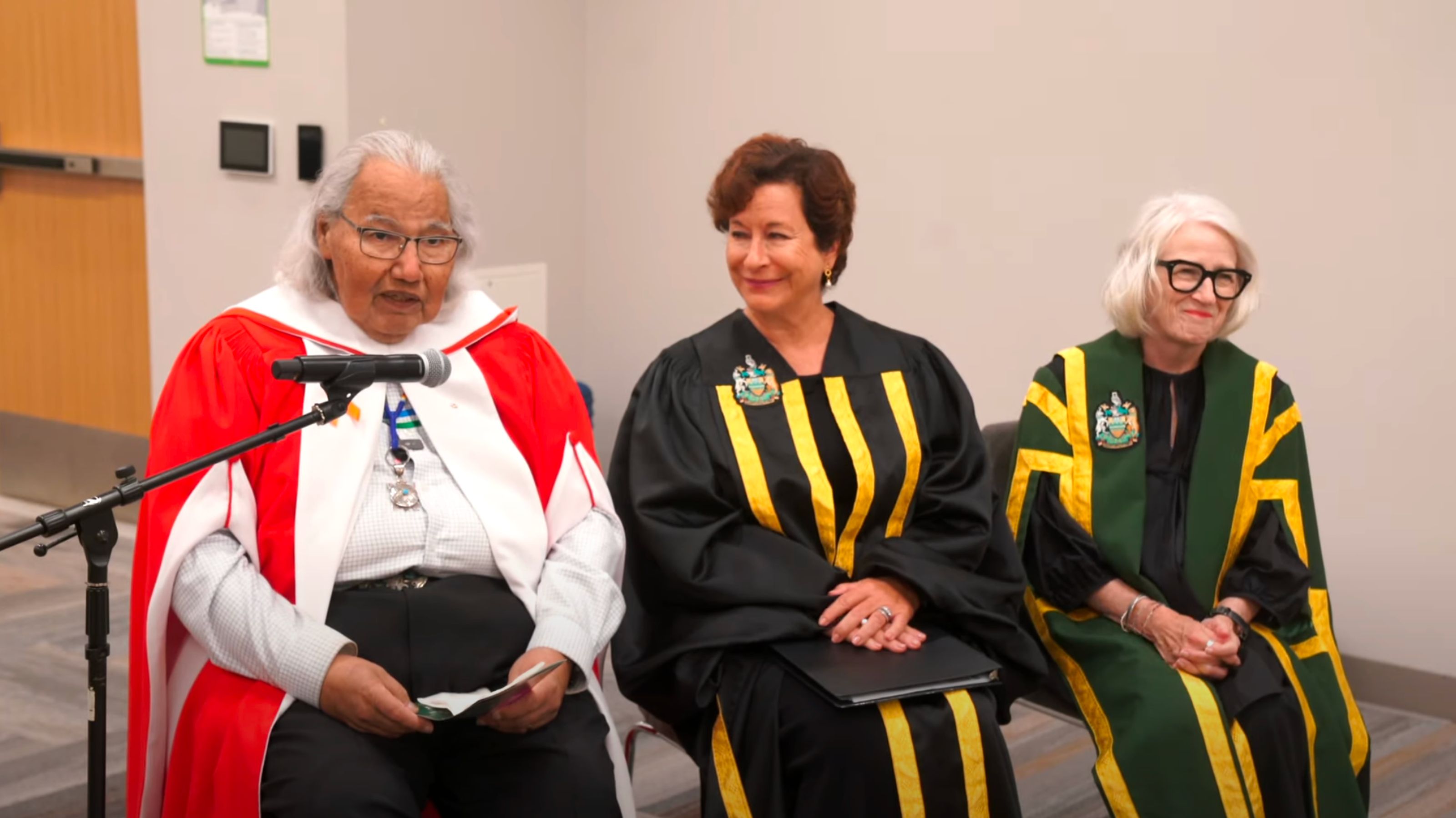 Three people seated: Honourable Murray Sinclair, Chancellor Peggy Garritty and Board Chair Kate Chisholm in Winnipeg for a special ceremony to confer an honorary Doctorate of Laws on the Honourable Sinclair.