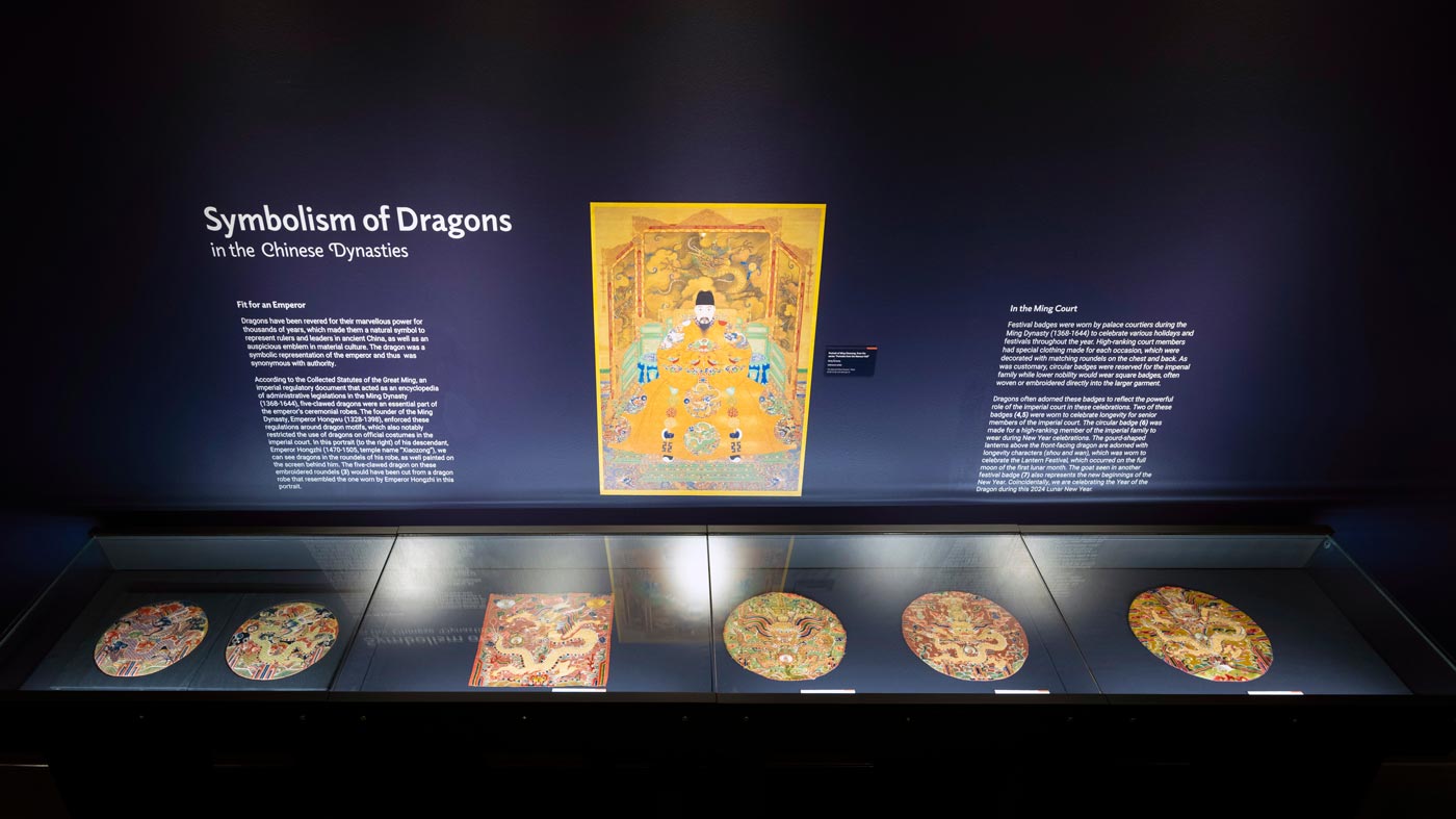 Symbolism of Dragons section of the Echoes of Thunder exhibit with 6 Ming Court badges worn during holidays and festivals